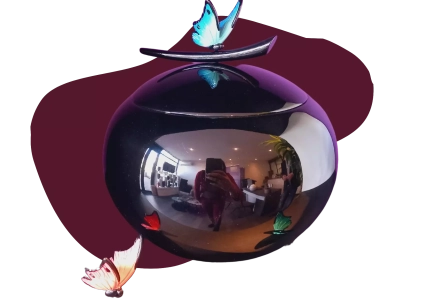 Urne résine et fibre de verre papillon 240€
